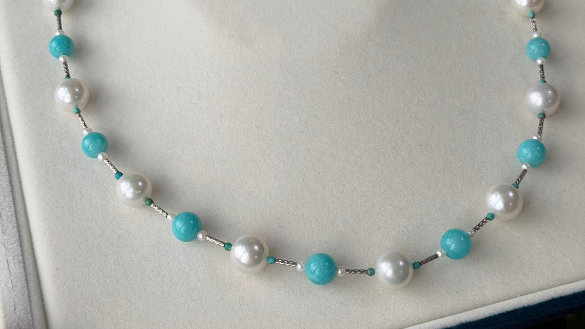 A uniquely designed necklace with white pearls and Amazonite blue stones s925 sterling silver spacers.