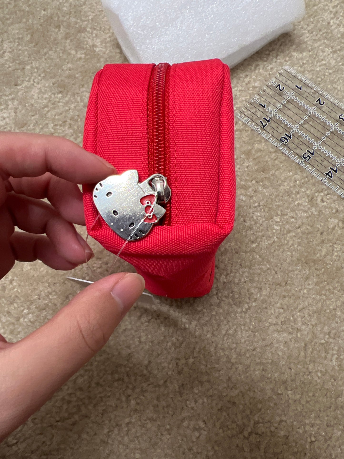 Red hello kitty medium bag with embroidery detail